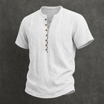 White linen button-up shirt
