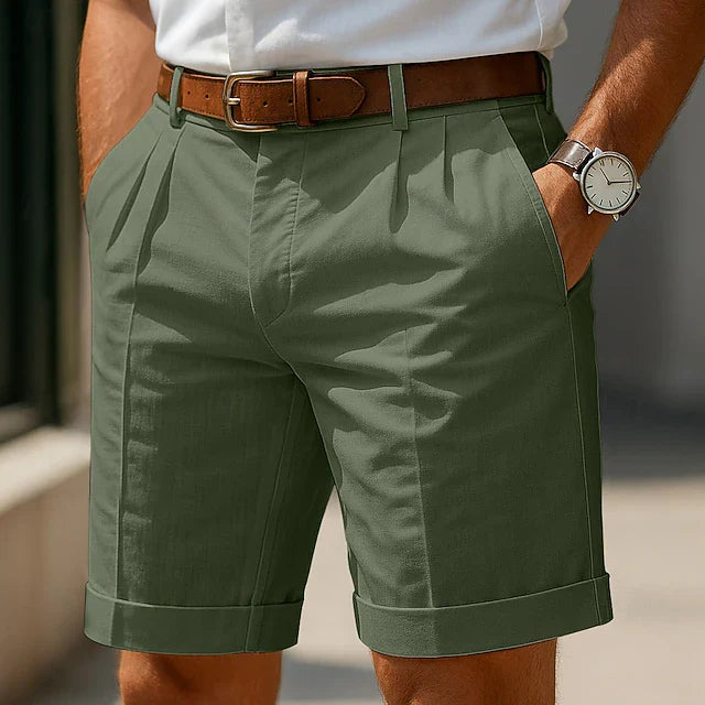 Green pleated tailored shorts